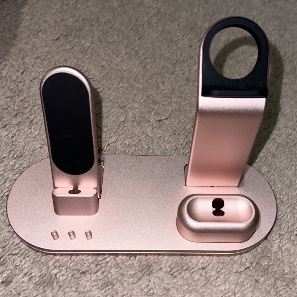 pink charging stand for phone, headphones, and watch, especially Apple products